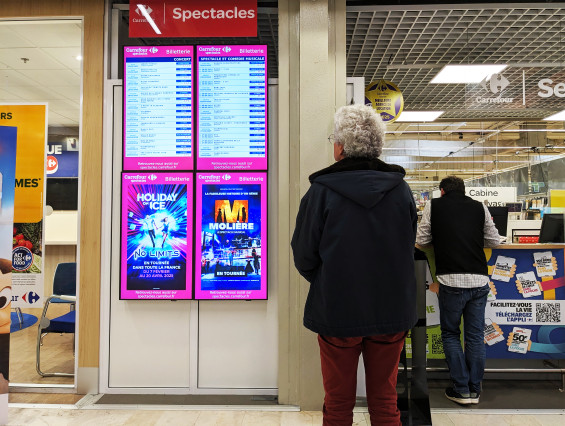 Ecrans d'affichage dynamique billetterie Carrefour Spectacles